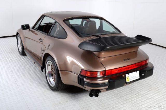 Name:  1988-porsche-911-930turbo-slant-nose-505-nougat-brown-metallic-very-original-2.jpg
Views: 303
Size:  38.0 KB