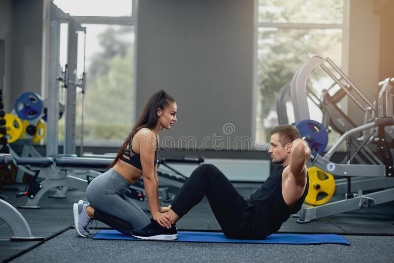 Name:  handsome-men-doing-abdominal-crunches-press-exercise-mat-sports-female-personal-trainer-gym-hot-.jpg
Views: 439
Size:  50.8 KB